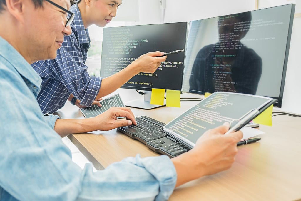 Programmer Working In A Software Development And Coding Technolo