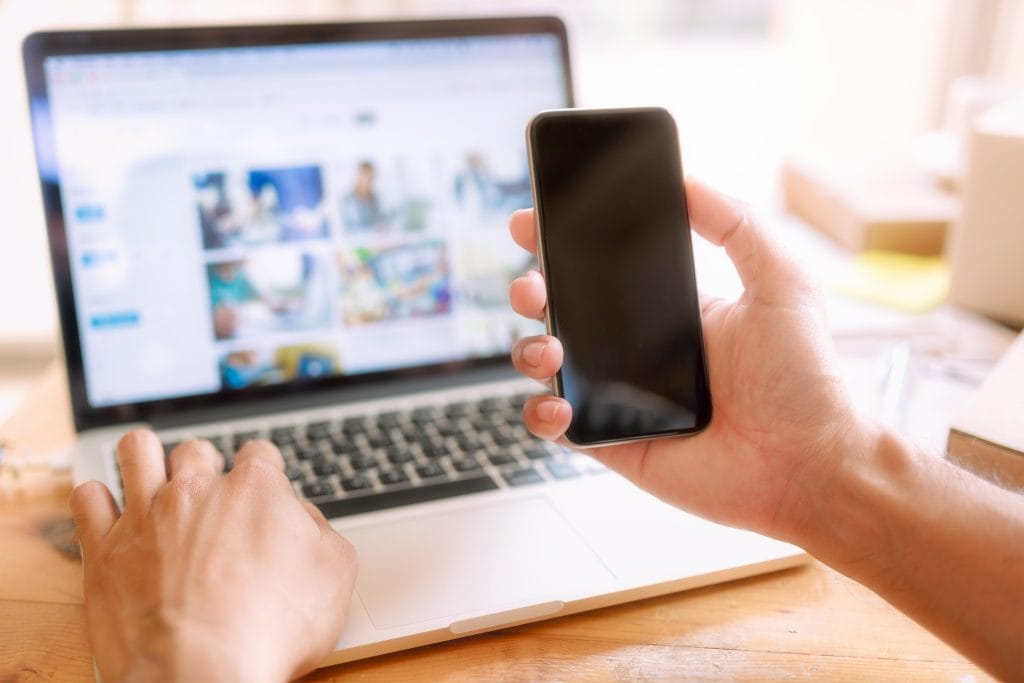 Hand Holding Smartphone Online Shopping Website Laptop Easy E Commerce Website Shop By