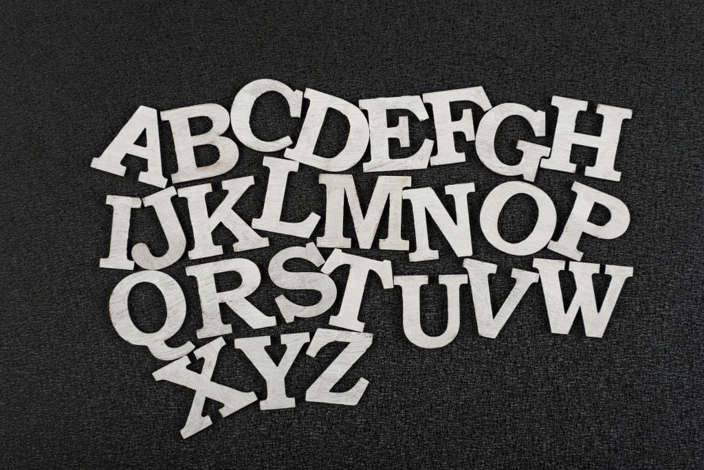 White Letters On Black Background. Nursery Alphabet
